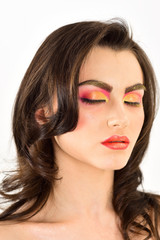 Dramatic eye makeup trend. A beauty of a girl. Sexy woman with color cosmetics. Beauty model with glamour look. Pretty woman wear creative makeup. Applying decorative cosmetics and makeup