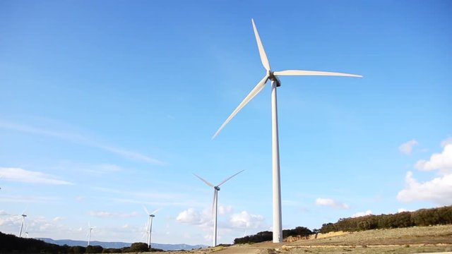 modern wind turbines generating sustainable energy