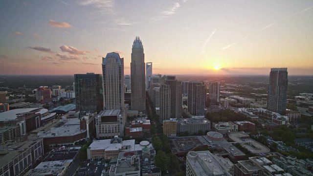 North Carolina Charlotte Aerial v36 Panning around downtown with cityscape in foreground at sunset 10/17