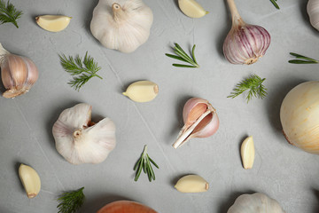 Flat lay composition with garlic on table