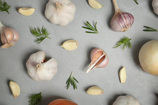 Flat lay composition with garlic on table