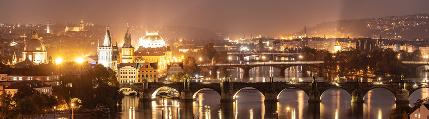 Fototapeta na wymiar Prague bridges over Vltava River in the evening, Praha, Czech Republic.