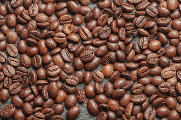 roasted coffee beans as background close up