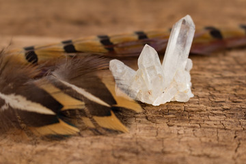 Close Up Feathers and Quartz Crystals