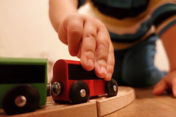 little hand with train toy
