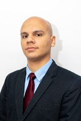 Bald man in suit and tie