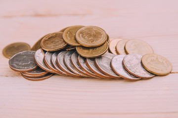 Thai baht coin on wooden table