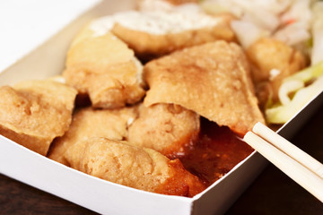 Stinky tofu in takeout food box