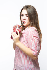 Naklejka premium Healthy Lifestyle. Beautiful Smiling Caucasian Woman Drinking Fresh Red Vegetable Juice. Healthy Eating, Diet And Lifestyle Concept.