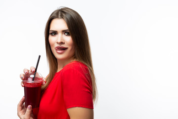 Healthy Lifestyle. Positive Smiling Girl With Cup of Red Smoothie Drink in Red Dress Posing Over White Background