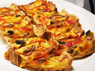  Sliced quiche on buffet table in hotel  