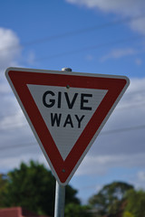 Give way sign in red triangle shape