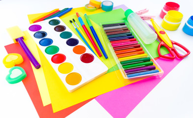 Naklejka premium School accessories are laid out in the form of a rainbow. white background.