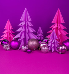 Obraz premium Christmas tree made of pink and purple craft paper.