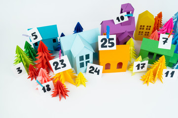 Advent calendar for kids rainbow color. House and Christmas tree paper craft.