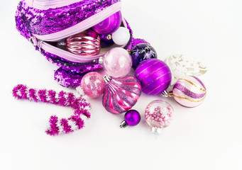 Decorations for the Christmas tree from a backpack on a white background.