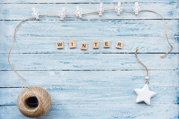 WINTER word on a blue and white background
