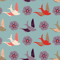 Beautiful birds and flowers in exotic colors make a great print for spring or fall. Seamless vector design for textiles, fashion, stationery, product packaging, home decor and graphic design.