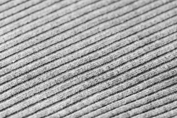 Gray knitwear as a texture and background close up