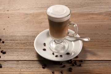 cup of coffee on wooden table