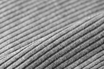 Gray knitwear as a texture and background close up