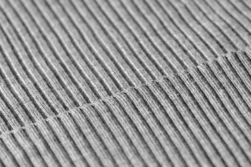 Gray knitwear as a texture and background close up