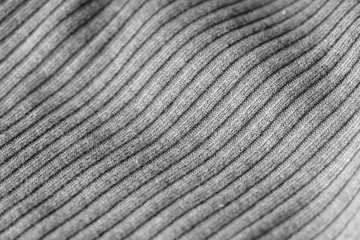 Gray knitwear as a texture and background close up