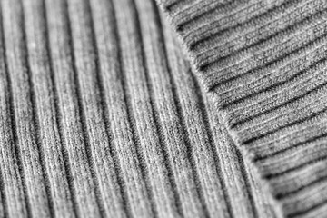 Gray knitwear as a texture and background close up