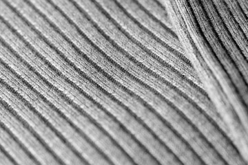 Gray knitwear as a texture and background close up
