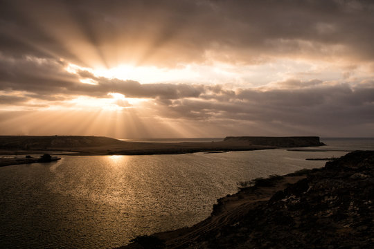 A beautiful sunrise over the ocean. Khor (Khawr) Rawri. Oman