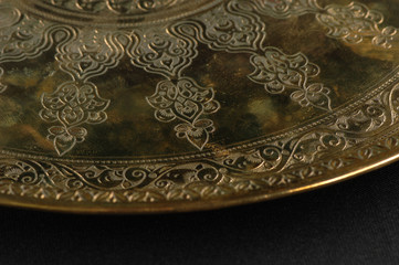 close-up of the tray with Eastern engraving