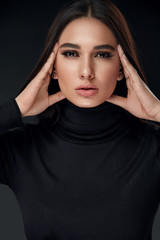 Beauty Face. Fashion Woman Model With Makeup On Black