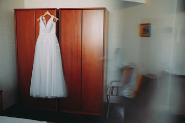 Fototapeta na wymiar wedding dress of the bride. morning preparations. accessories