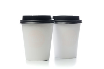 two coffee to go on white background