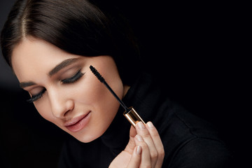 Beauty Makeup. Woman With Long Black Eyelashes And Mascara Brush