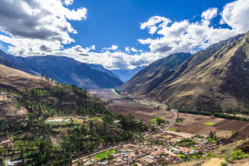 Fototapeta na wymiar City in the Andes valley at the foot of the mountains