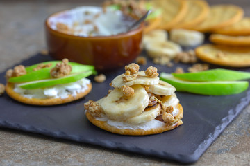 Bananas and Apples on Whole Wheat Crackers