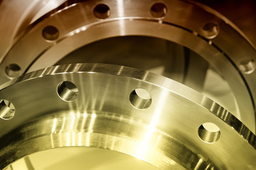 Ring-shaped industrial steel details. Brown toned image