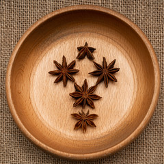 Star anise in a wooden bowl