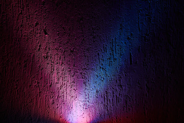 Rays of light pink and blue shining from one point