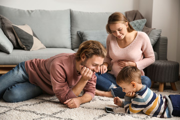 Happy family spending time at home