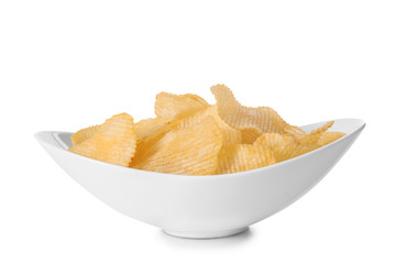 Bowl with tasty crispy potato chips on white background