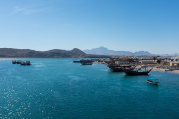 Traditional wooden dhow boats in Sur, Oman