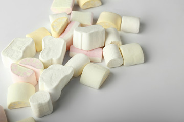 Fototapeta na wymiar Tasty marshmallows on grey background