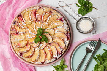 Tasty apple pie on white table