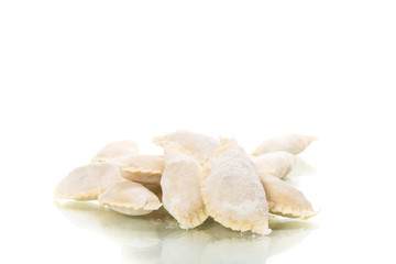 Dumplings raw with stuffing on a white background