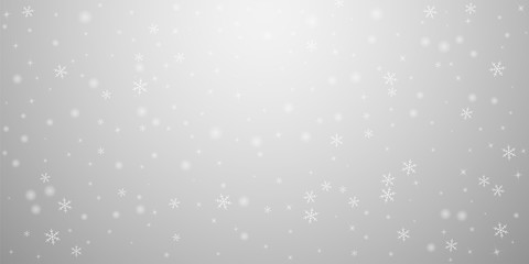 Sparse glowing snow Christmas background. Subtle f