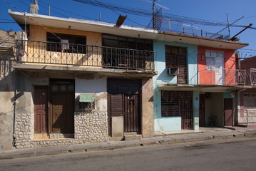 Fototapeta na wymiar Partially renovated house in Santiago de Cuba in Cuba