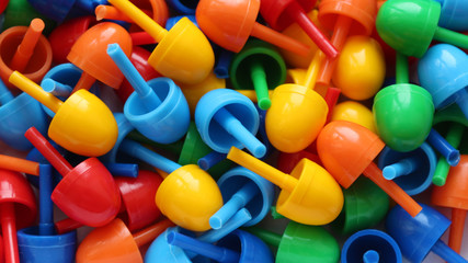 colorful push pins on white background
