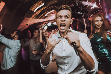 Young People. Sing. Microphone. Great Mood.